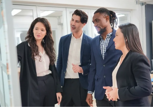 Colleagues discussing a project together