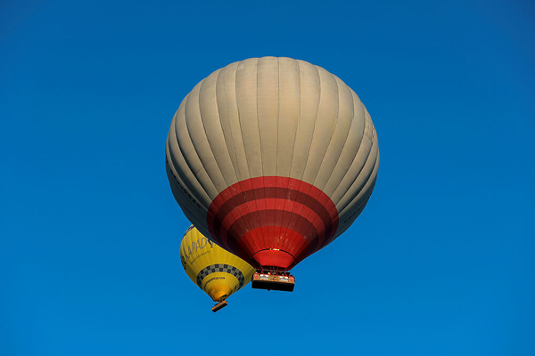 Remove text from hot air balloons cappadocia sunrise flight blue sky after