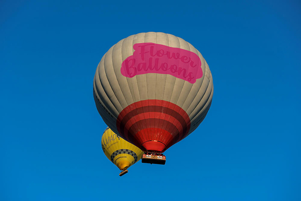 Remove text from hot air balloons cappadocia sunrise flight blue sky before
