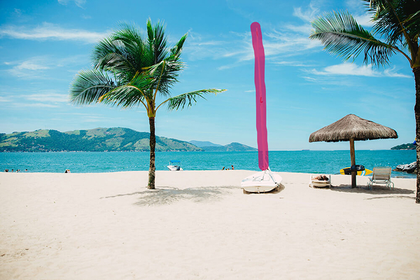 Remove objects from tropical beach paradise photo before